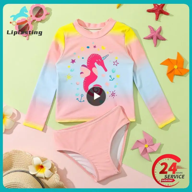 

Купальник из двух предметов с длинным рукавом и разрезом