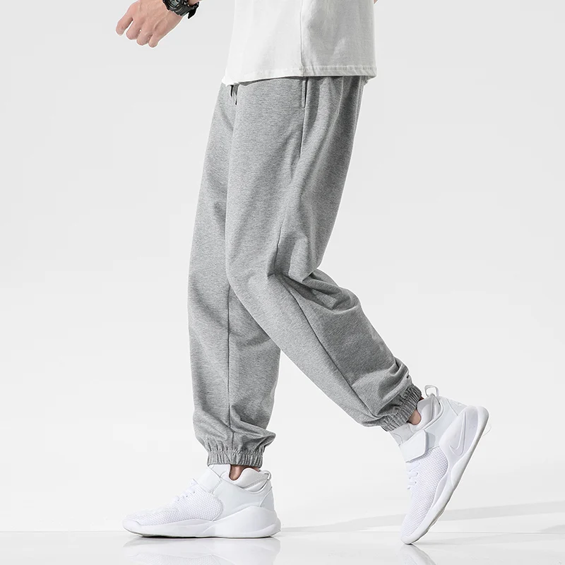 Męskie spodnie dresowe Single Road męskie podstawowe puste solidne, luźne biegacze spodnie sportowe do biegania spodnie Casual szare spodnie do joggingu_voghion.com