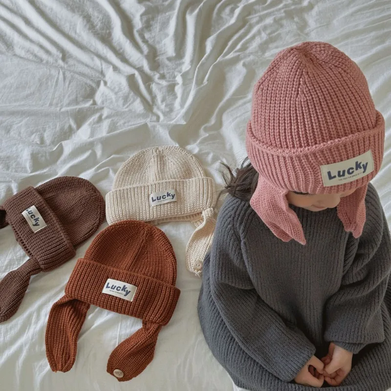 Рисунок 3 - Осенне-зимние детские шапки вязаные