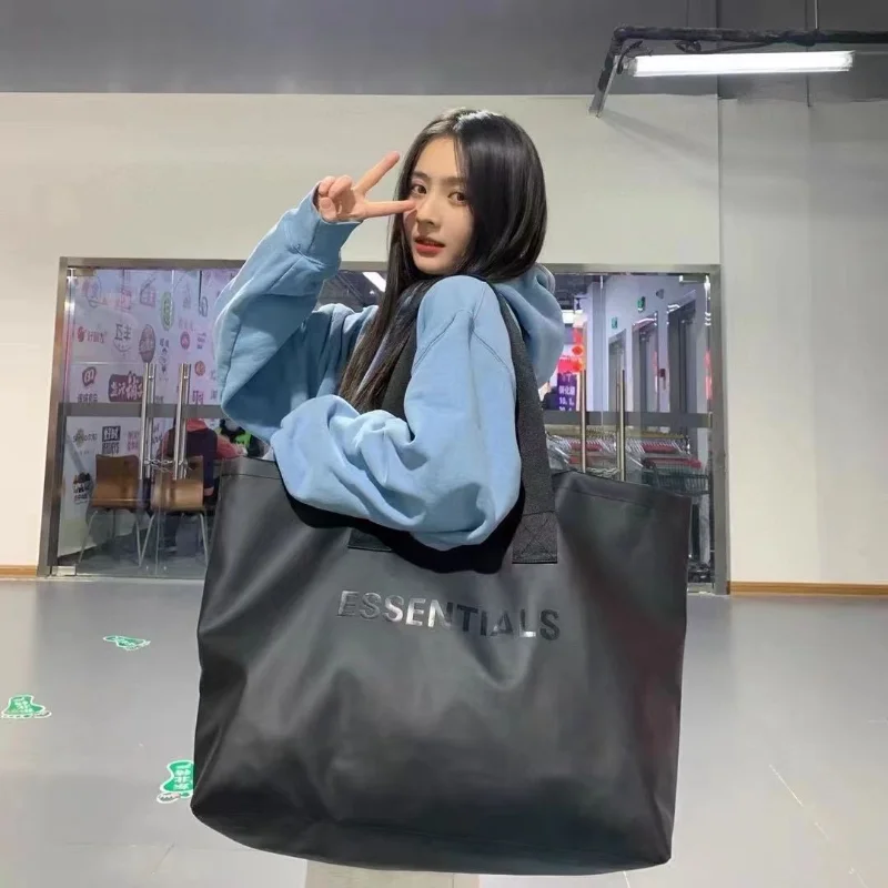 

Essentials Tote Bag Men Luxury Shopping Bag Diagonal Handbag for Women Travel bag Casual PU Unisex Black High Capacity Wild Bags