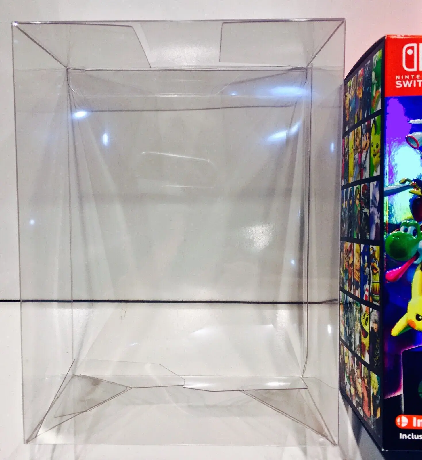 1 Scatola Di Protezione Per Super Smash Bros Ultimate Nintendo Switch Display Case Nuovo