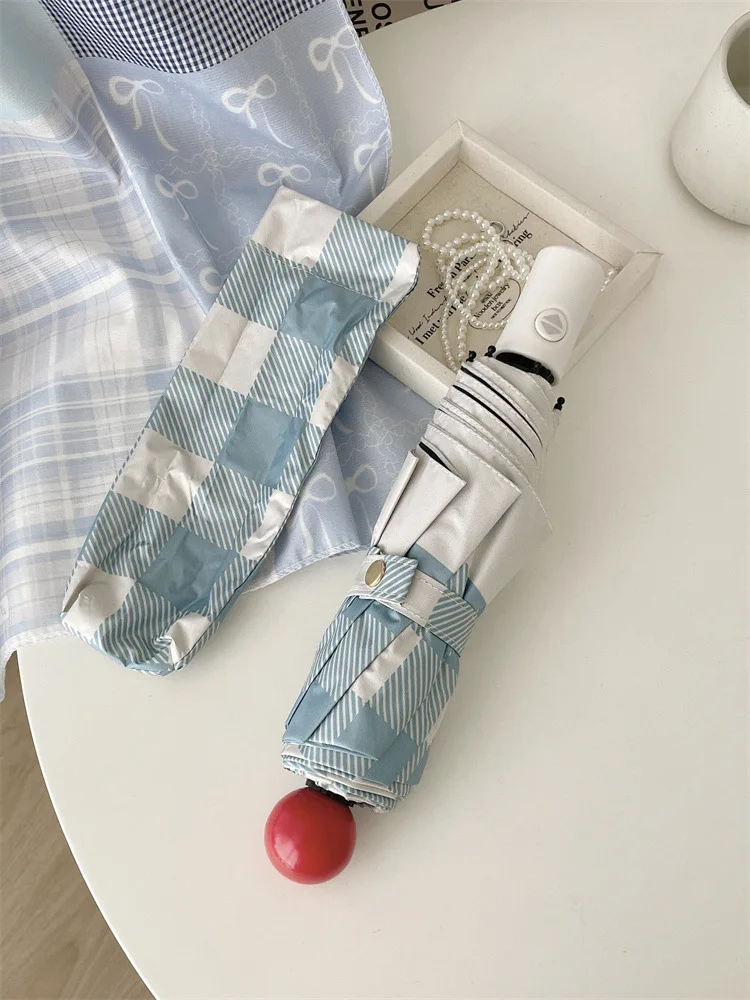 Compact Dual-Use Automatic Umbrella with UV Protection and Minimalist Grid Design