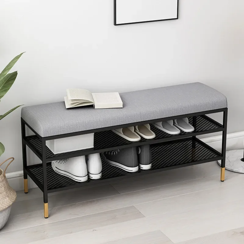 

Lightweight and does not occupy the place Nordic shoe stool durable leather seat home door can sit through the shoe cabinet