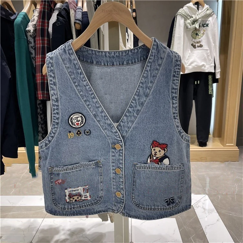 

Женский джинсовый жилет с V-образным вырезом и карманами