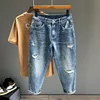New Men's Ripped Jeans Personality Fashion Tapered Hole Frayed Denim Trousers Streetwear Casual Vintage Blue Pants Male Clothes