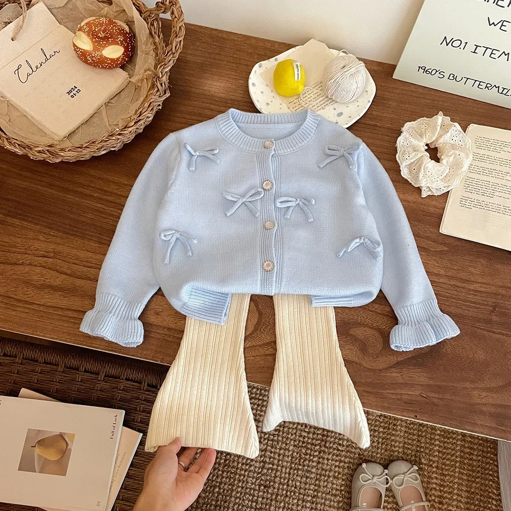 Ropa para niños 2024 Otoño e Invierno nuevo artículo niñas cárdigan de punto con lazo suéter chaqueta lindo bebé dulce Top moda