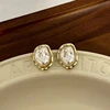Boucles d'oreilles Vintage en forme de cercle pour femmes, bijoux baroques en perles, couleur or, clip rond, tempérament élégant, cadeaux de fête, nouvelle collection