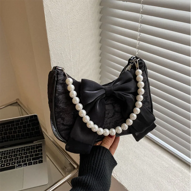 Fashion bow handheld pearl bag trend new crossbody small bag ladies shoulder