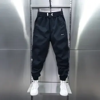 Pantaloni hiphop lunghi casual primaverili e autunnali da uomo nuovo stile rilegatura pantaloni sportivi da uomo con gamba dritta allentata nera piede piccolo 1