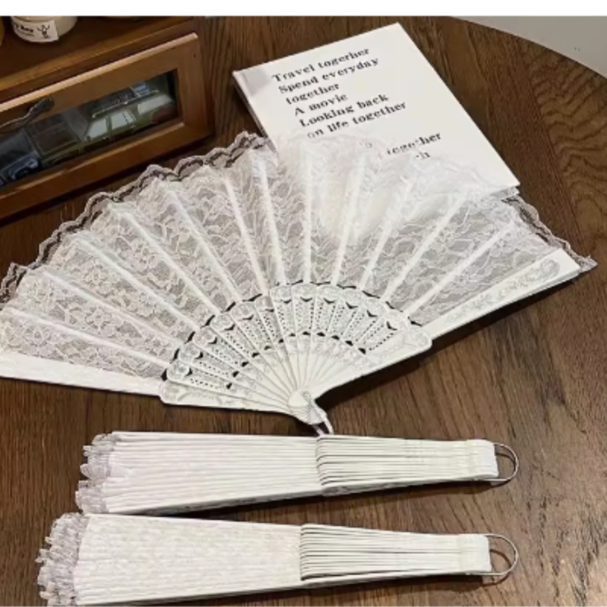 

1 set of white lace hot stamping gold and silver folding fan swing props