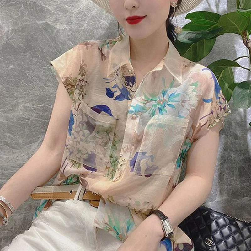 

Fashion Lapel Printed Loose Pockets Asymmetrical Shirt Women's Clothing 2023 Summer New Casual Tops Office Lady Chiffon Blouse