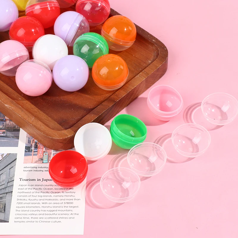 100Pcs 플라스틱 빈 장난감 판매 캡슐 하프 클리어 하프 컬러 라운드 볼