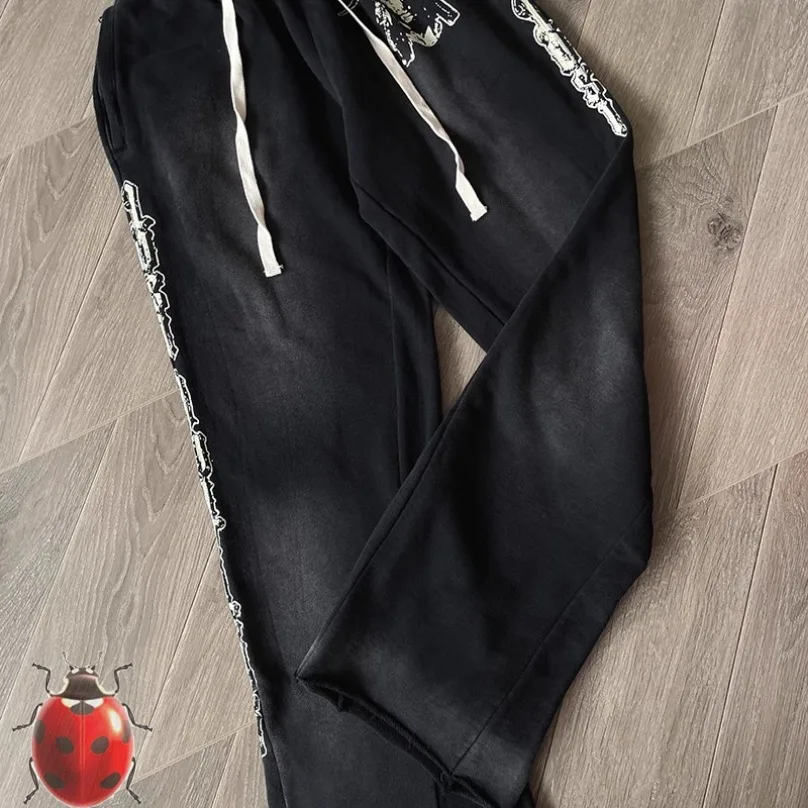 Lost Intricacy Portrait Print Track Pants Classic Side Logo Mini Flared Trousers Men Women Loose Casual Drawstring Sweatpants