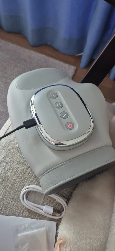 Customer review photo hand massager in use
