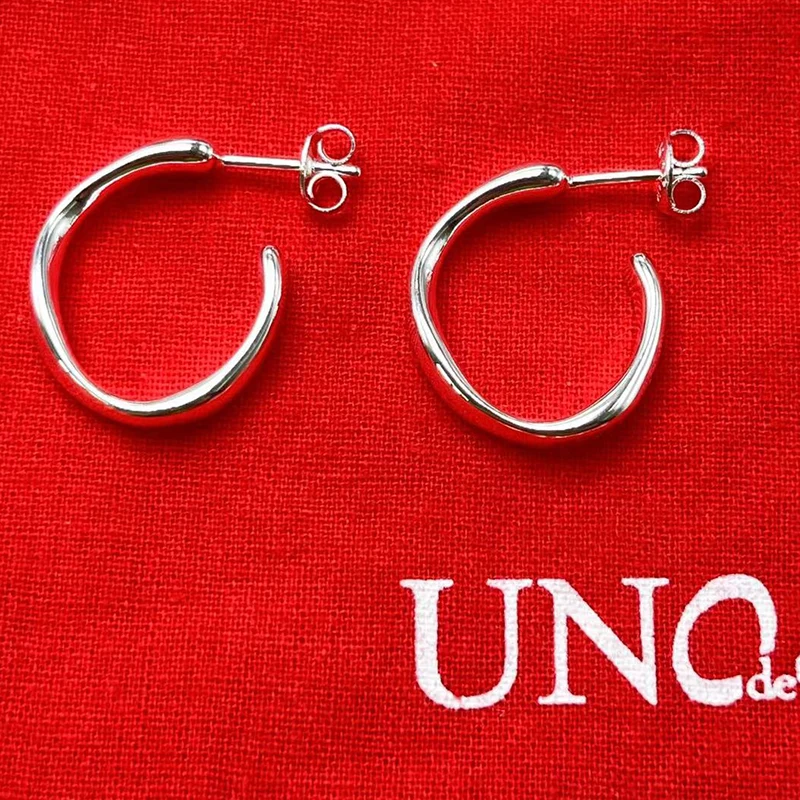 

Самые продаваемые европейские и американские простые геометрические женские серьги unode 50 2023, романтичные ювелирные изделия, Подарочный пакет с сумкой