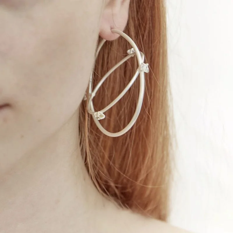 The New Double-Loop Rotating Earrings For 2024 Are A Party Gift For Women's Cyberpunk Style Copper Alloy Jewelry