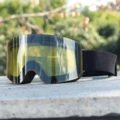 J (yellow lens)