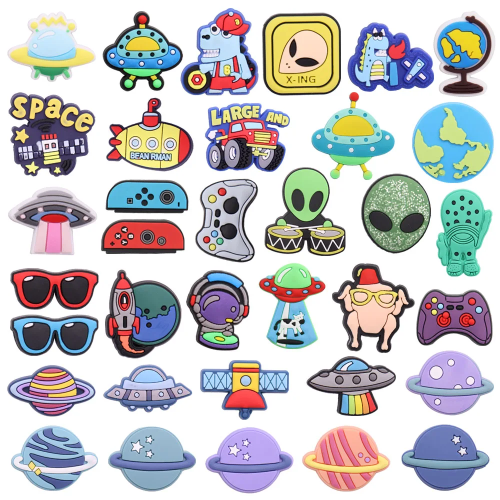 

Wholesale 50pcs UFO Gamepad Submarine Planet Shoes Charms Accessories Kids Cool Sandals Buckle for Bracelets Croc Jibz