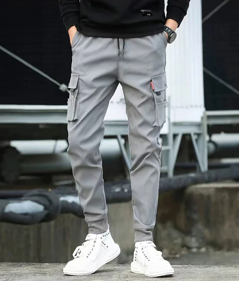 Men's fashion overalls ins loose foot binding function casual casual casual Hong Kong wind with nine pants