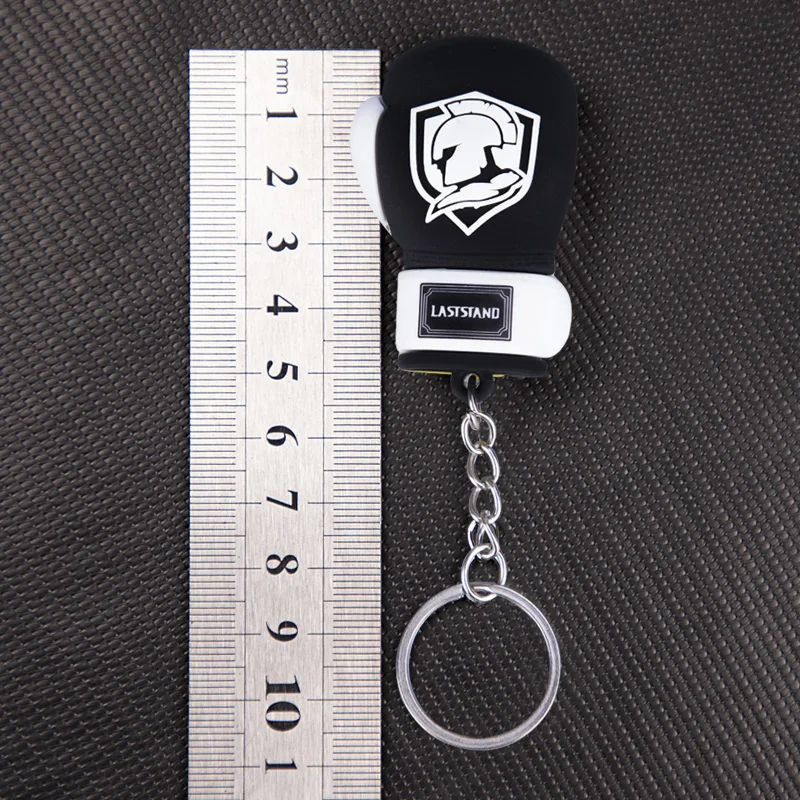 Description Picture 2 of itemMini Boxing gloves Keys holder punch sandbag pendant Muay thai kicking MMA glove Taekwondo targets key ring kid gloves Ornaments