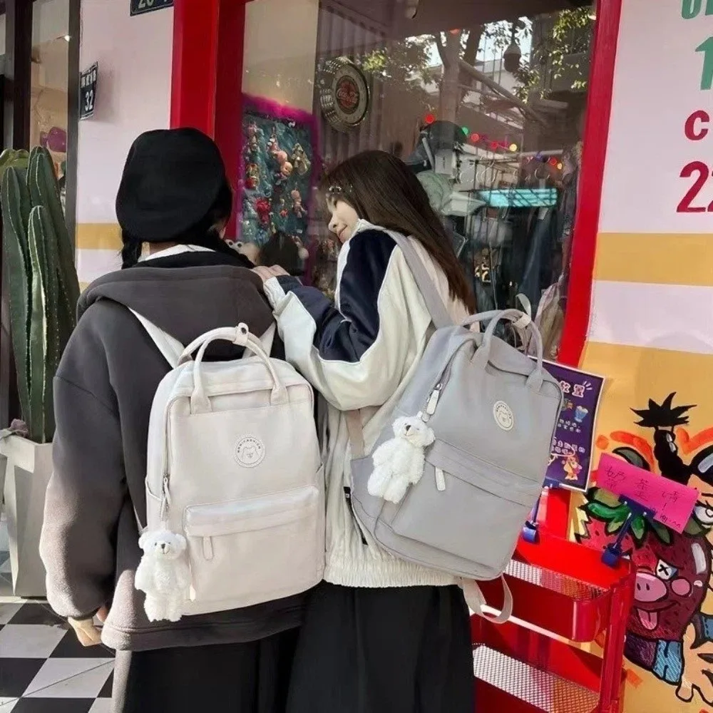 Solid Large Capacity Student Backpack Zipper Nylon Academy Girl's School Bag Spacious Multi-Pocket Plush Pendant Teens Rucksack 3