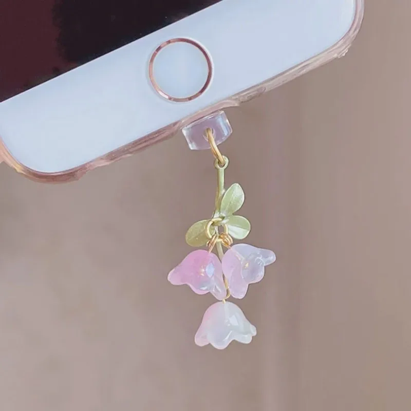 Charming Pink Lily of the Valley Phone Accessory with Green Leaf Accent