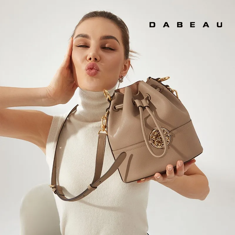 1.Classic bucket shaped bag with rounded, full, and diverse details