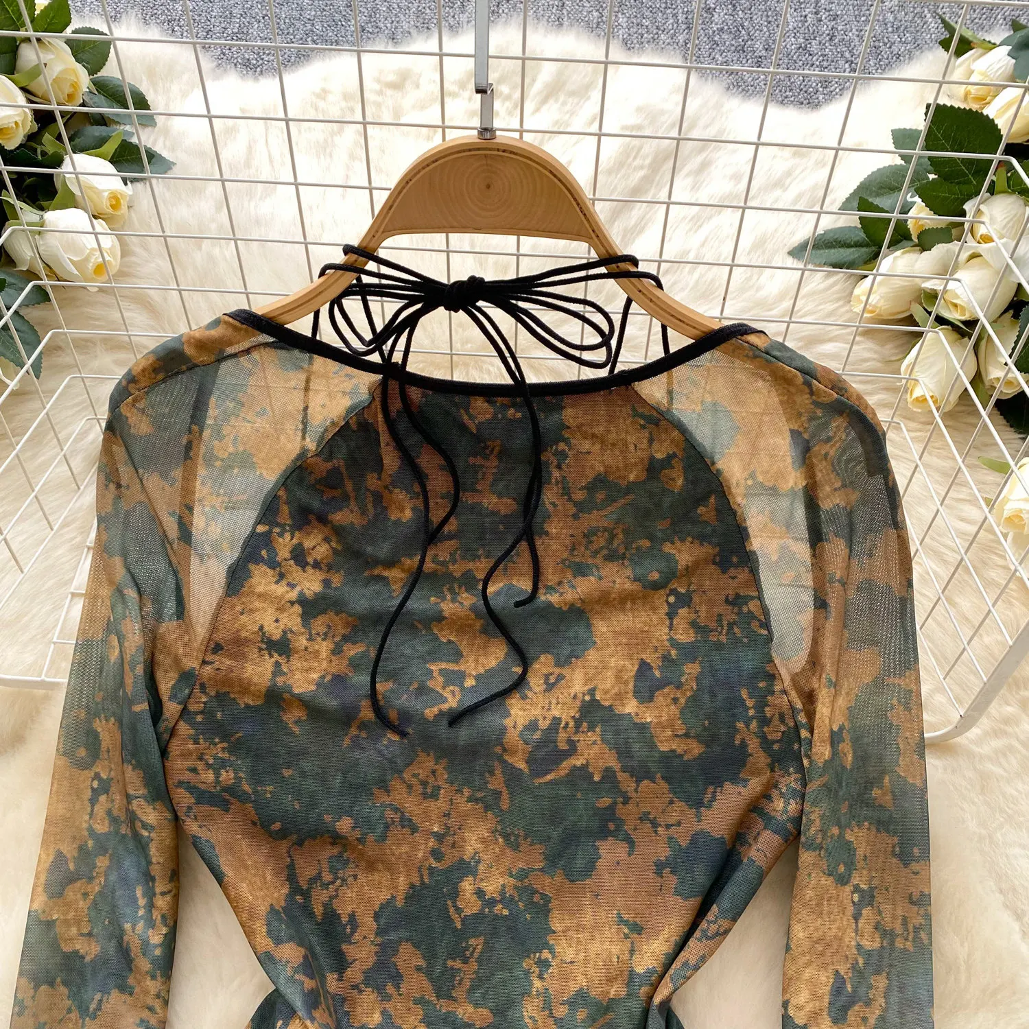lace-up neckline detail on bodysuit