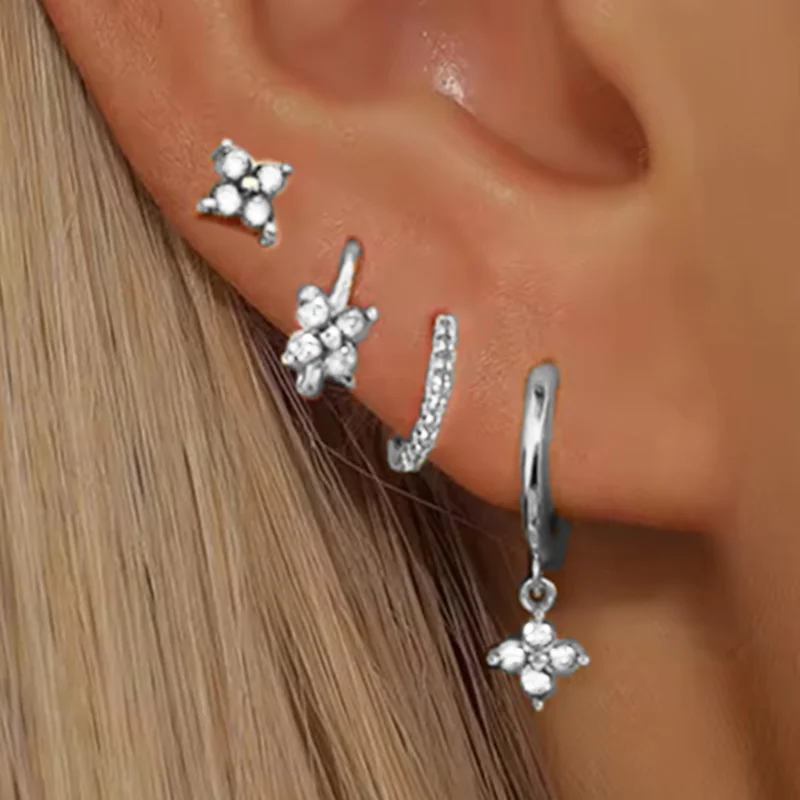 Green huggie hoop earring set close-up