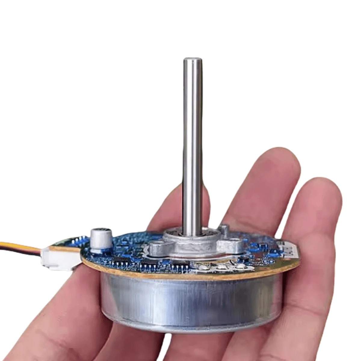 Moteur sans balais à rotor horizontal 42F704Q780 de 54mm, présenté en angle pour voir les ailettes de refroidissement.
