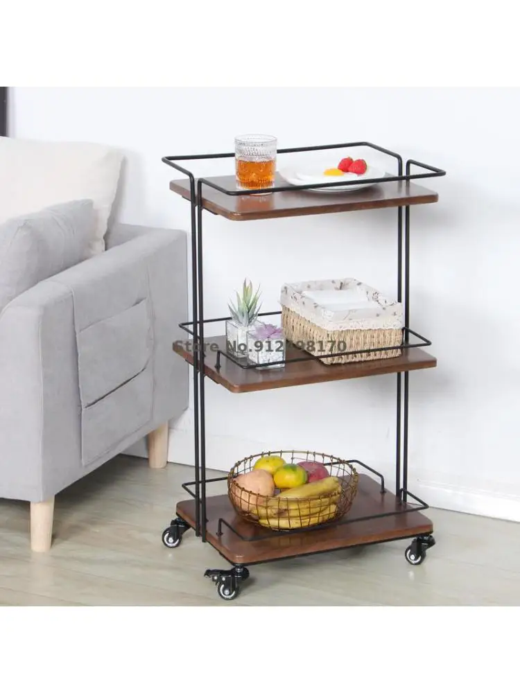 A few corners on the side of a Japanese sofa, a movable iron dining car, multi-layer rack, kitchen storage rack, living