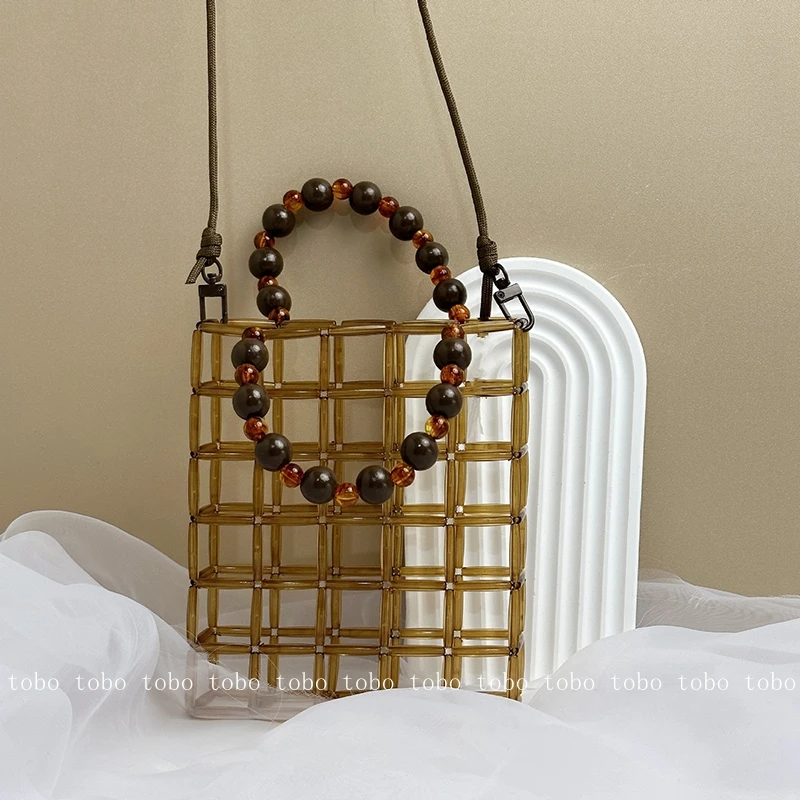 

2023 Beach Holiday Vacation Ladies Totes Summer New Handwoven Hollow Out Women Handbags Beaded Handle String Crossbody Bags