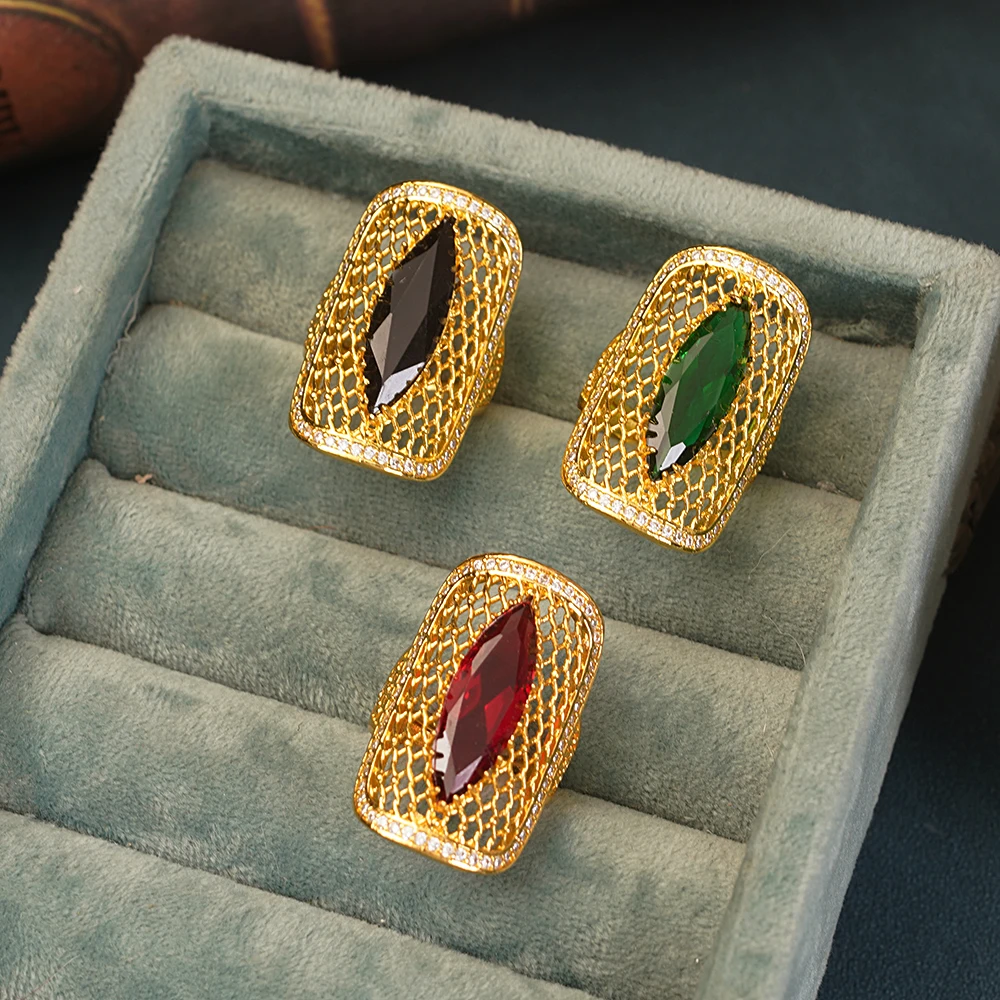 Adorn yourself with our Copper Gilded Red Zircon Ring for a bold and stylish statement.