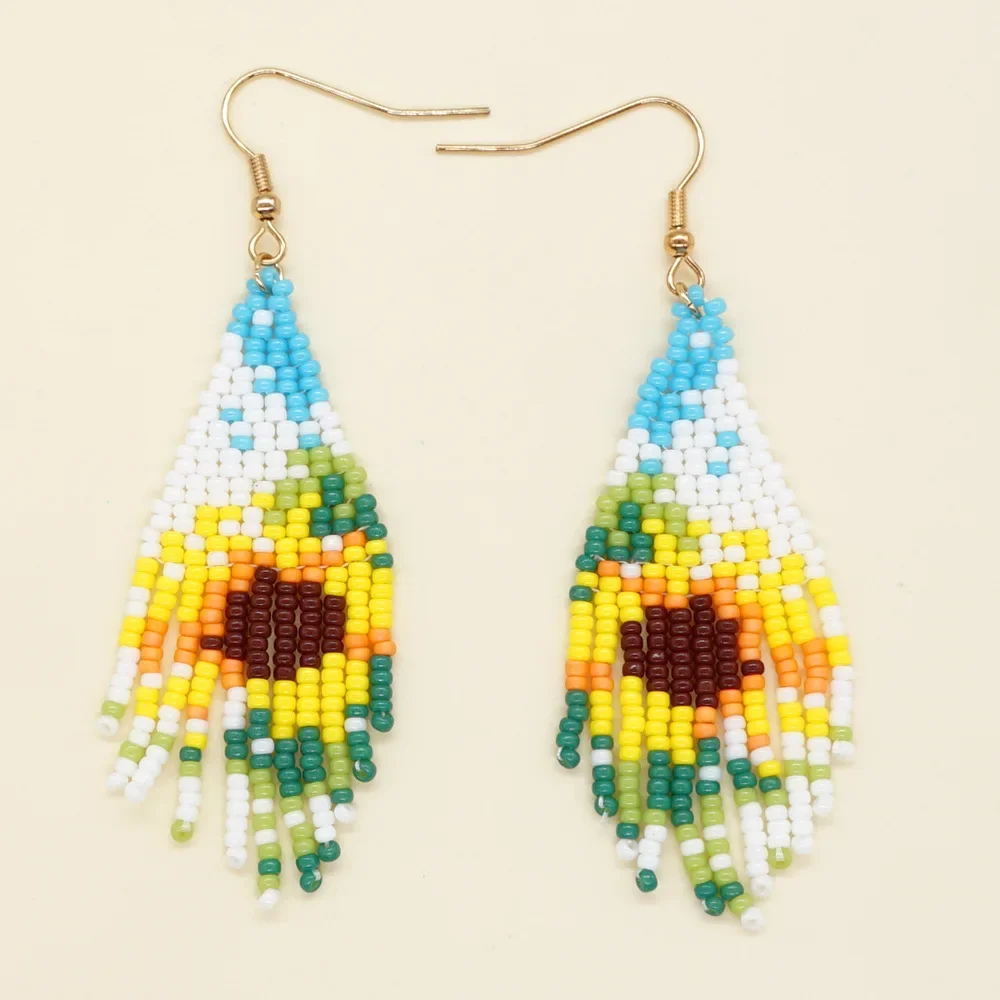 

Fringe Earrings Hand knitting Bohemia Beading Simple rainbow eye Sunflower geometry alloy ma'am Rice Bead Earrings