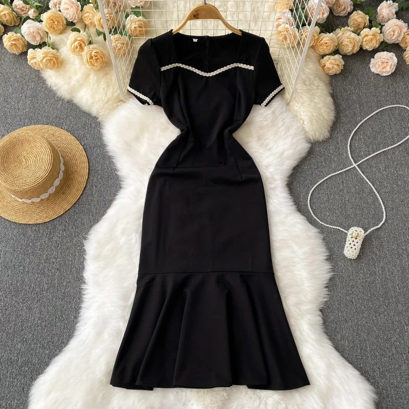 

New Vintage Hepburn Wind Slim Mid-length Ruffle Fishtail Dress Woman