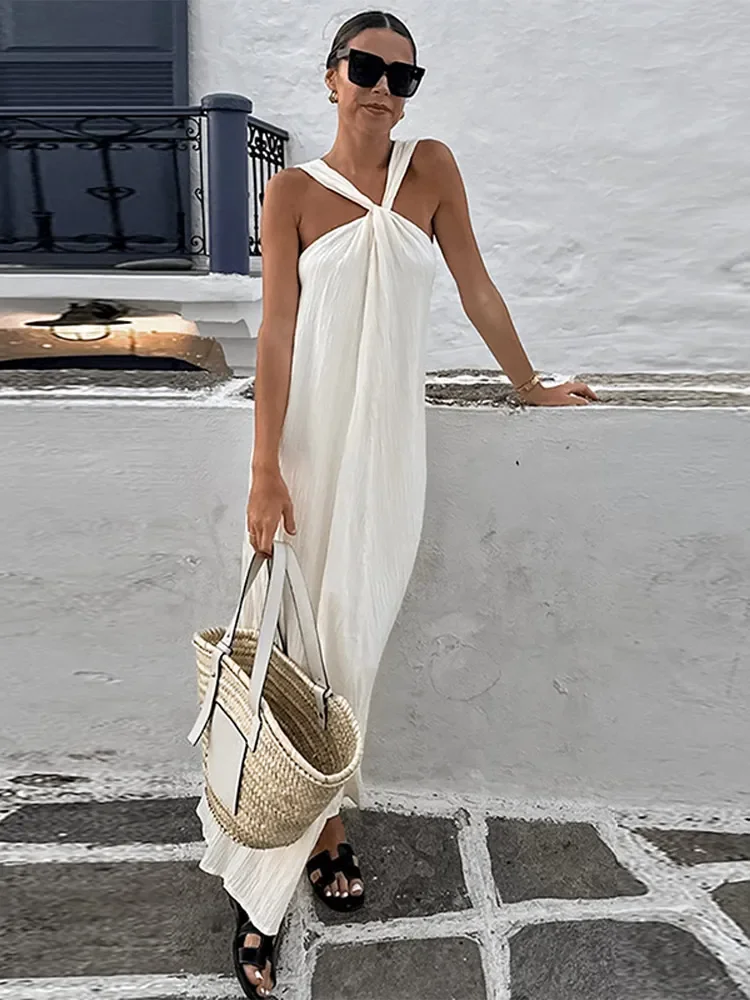meghan markle white dress beach style Meghan Markle Dons a White Slipdress with Peekaboo Lace Bra on the Beach