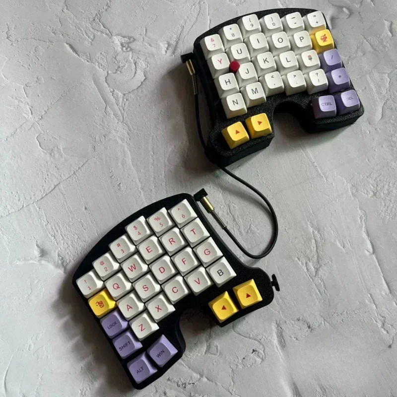 人間工学に基づいたメカニカルキーボードキット、小さな赤い点