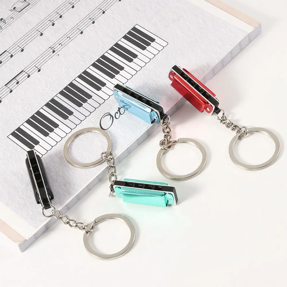 

Mini Keychain Harmonica Portable 8 Tone 4 Holes Harmonica Children Gifts DIY Necklace Accessories Wedding Souvenir Harmonica