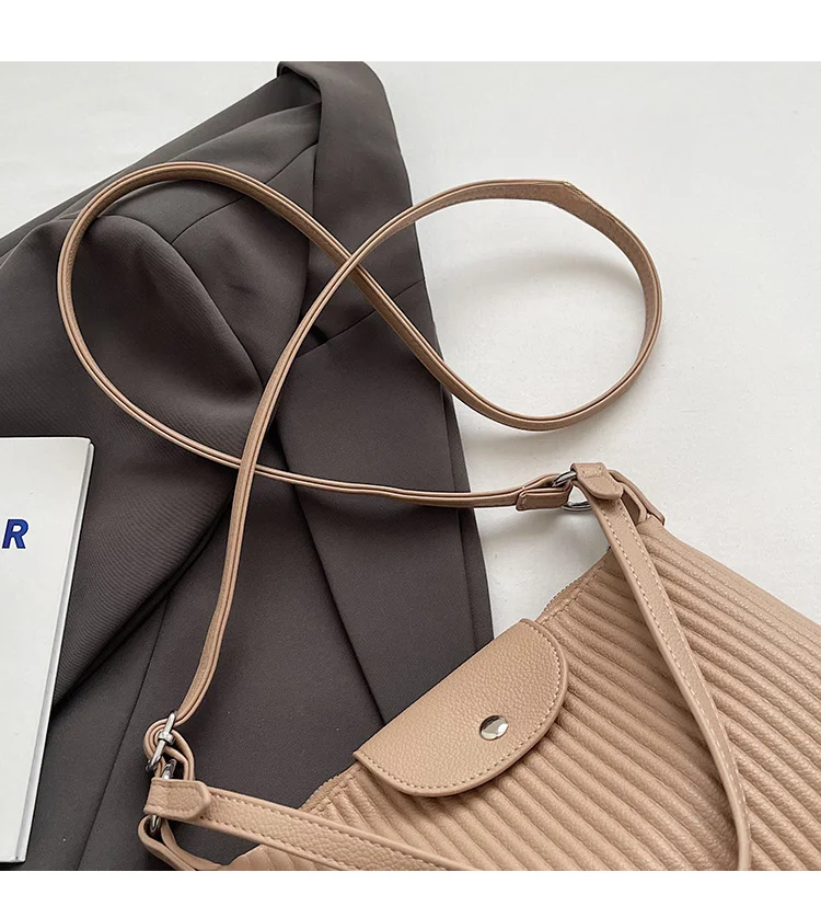 Niche design pleated striped 2024 new women's versatile and simple single shoulder pillow crossbody armpit bag_voghion.com