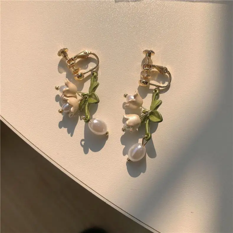 S266d1c1ebd2d4487b1f978f4d47d6eb3c Elegant White Orchid Flower Earring for Women Ladies Temperament Metal Leaves Long Tassel Drop Earrings Hook Jewelry Accessories Mallzona