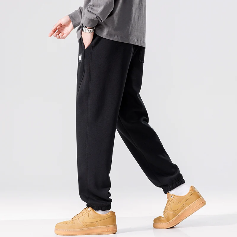 Spring Autumn New Solid Color Fashion Elastic Waist Sweatpants Man High Street Casual Loose Pockets Drawstring Cotton Trousers