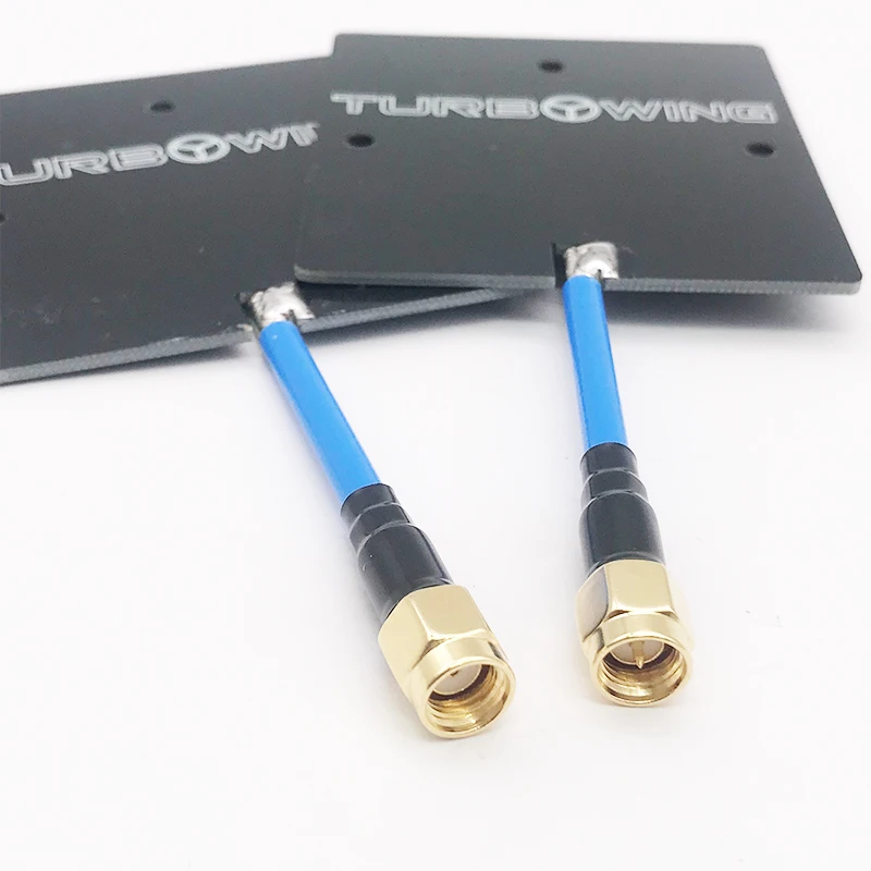 Antenne panneau 5.8G 14dBi pour drone FPV RC, connecteur RP-SMA doré visible en gros plan.