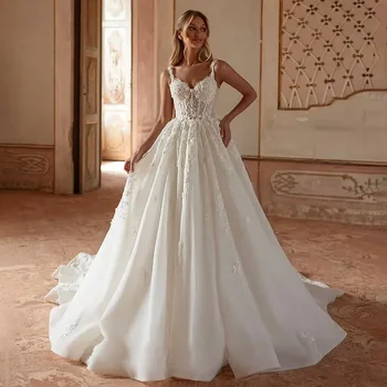 Abiti da sposa in pizzo stile principessa con perline senza maniche personalizzati Abiti da sposa bianchi a trapezio con scollo a cuore
