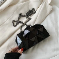 Turn Heads with the Confident Queen Gold Box Clutch 4