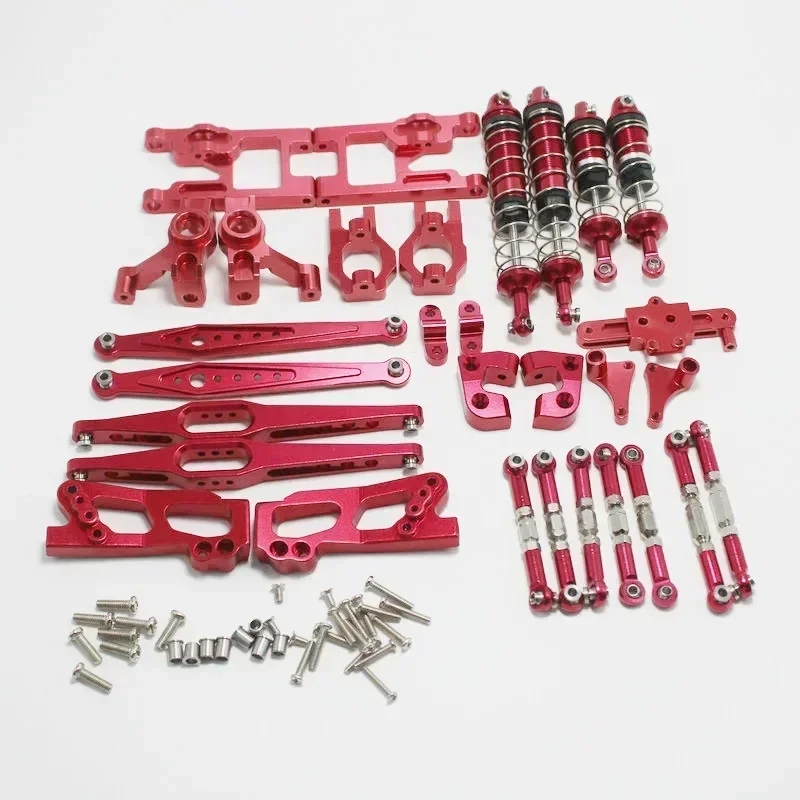 Vue détaillée des amortisseurs et accessoires du kit métal pour WLtoys 12423 Feiyue FY03