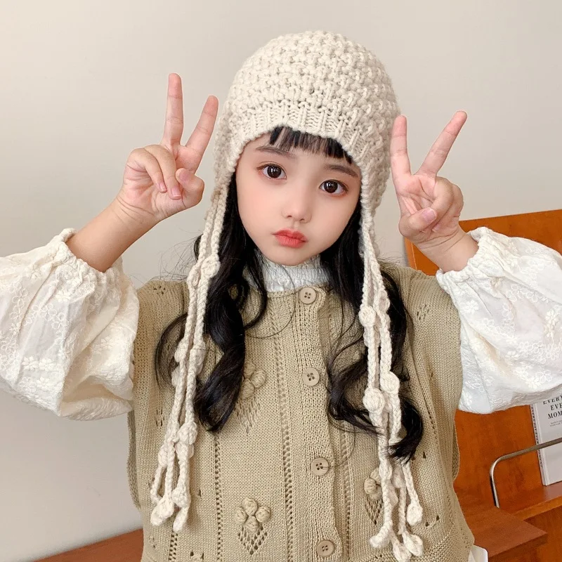 Tassel ladylike style ins children's woolen hats, trendy autumn and winter handmade girls' baby knitted ear protection hats