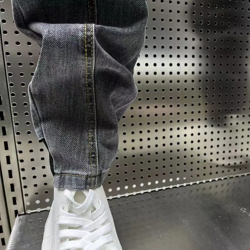 New Arrival Korean Style Fashion Stretch Denim Jeans for Men Elastic Waistband Drawstring Design Harem Jeans Cotton Trousers