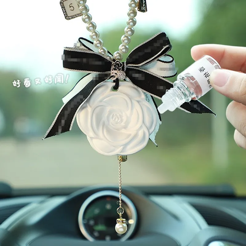 

Car Fragrance Pendant Camellia Diffuser Stone Aromatherapy Rearview Mirror String of Pearls Pendant Auto Accessoires Voiture