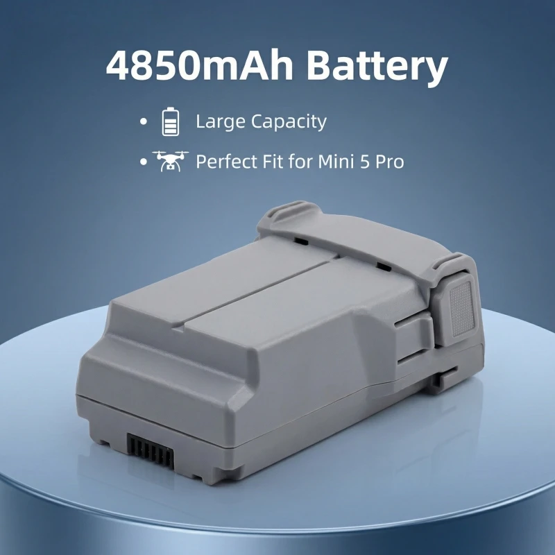 Batterie drone 4850mAh insérée dans un drone selfie poche, prête à voler 51 minutes.