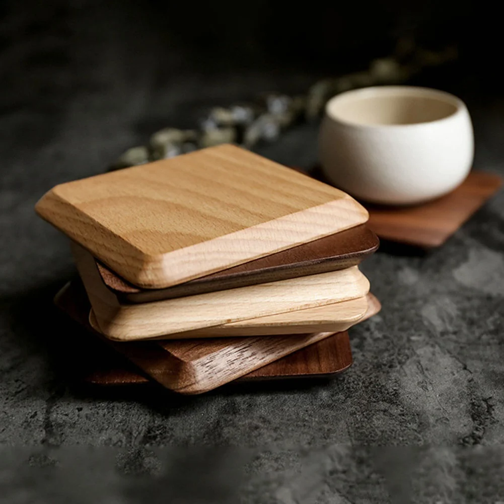 https://ae01.alicdn.com/kf/S26f8fecfd40f475ea1c509919d58e541s/1-6pcs-Tea-Coffee-Cup-Pad-Placemats-Decor-Walnut-Wood-Coasters-Heat-Resistant-Square-Round-Drink.jpg